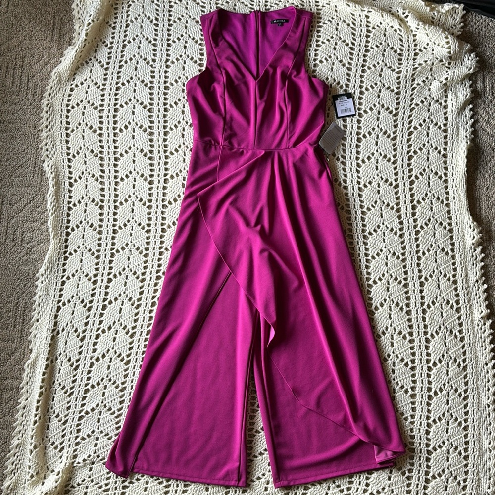 Sleeveless jumpsuit with draped skirting
